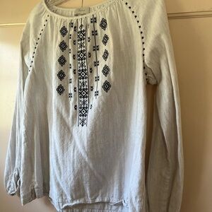 Embroidered Wrap London blouse.